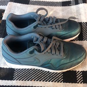 Metallic blue Nike Air tennis shoes